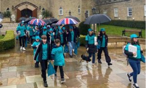 uk lions and mentors leave saint hill in the rain