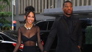 Meagan Good Wore a Black Nookie Dress with Florde Maria Shoe and Alexis Bittar Jewelry to the Frederick Douglass Annual Awards Dinner with Beau Jonathan Majors feat image