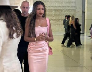 Blue Ivy Attends the Wicked Premiere in a Pink House of CB Strapless Dress copy