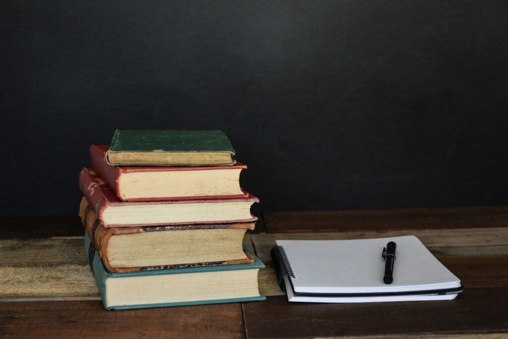 stack of books and notebook